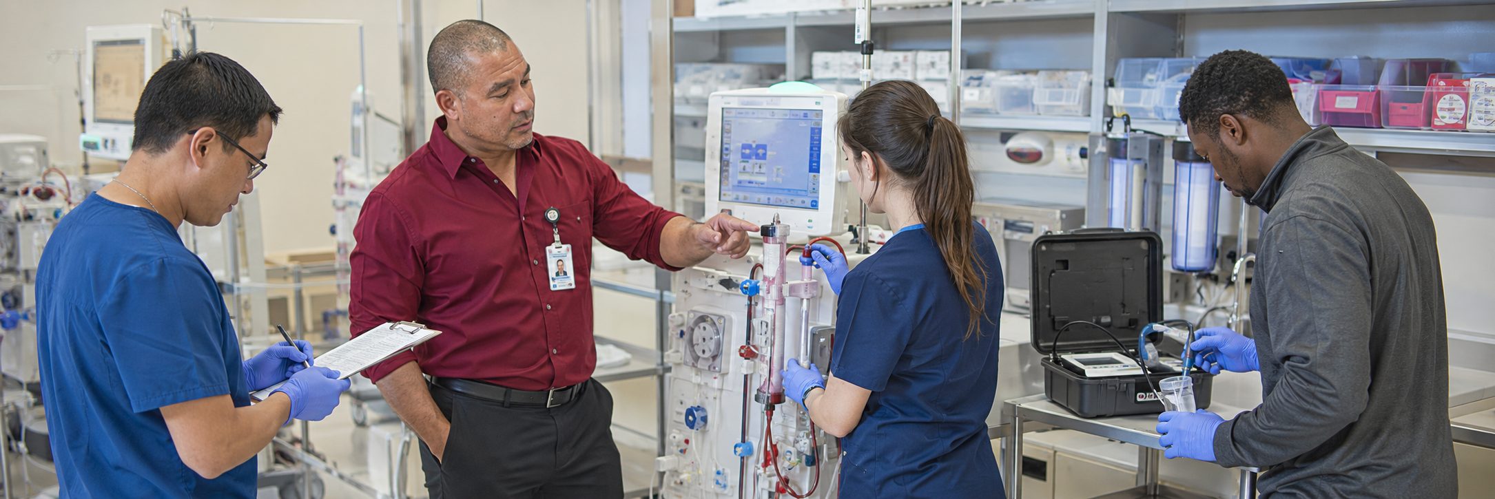 Biomedical equipment technicians performing anesthesia machine preventive maintenance